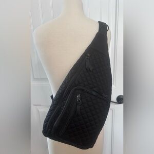 Vera Bradley sling backpack.  Black in color.